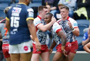 Picture by Ed Sykes/SWpix.com - 06/08/2023 - Rugby League - Betfred Super League Round 21 - Leeds Rhinos v Leigh Leopards - Headingley Stadium, Leeds, England - Leigh Leopards' Edwin Ipape celebrates scoring their first try